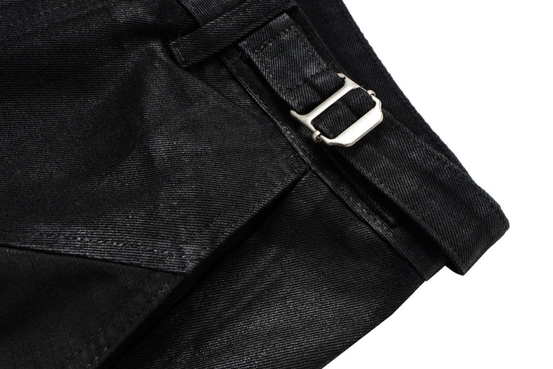 Close-up of black pants side belt loop and buckle hardware