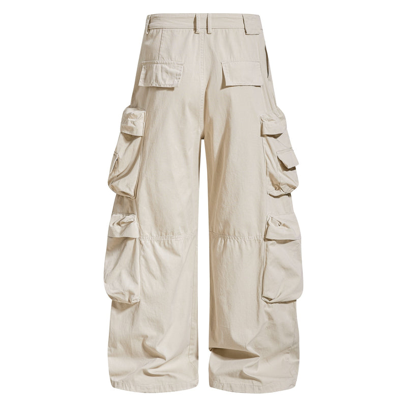 Beige cargo pants back view with multiple side pockets and wide legs
