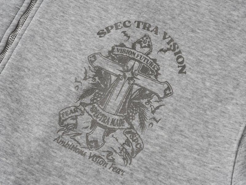 Close-up of gray hoodie chest print showing gothic crest and text