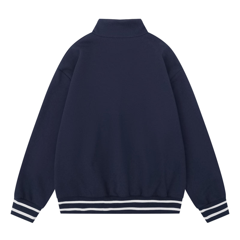 Back view of navy half-zip mockneck sweatshirt with striped hem and cuffs