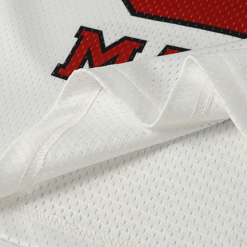 White mesh Donald Duck football jersey fabric with red and black graphic details, close-up streetwear design
