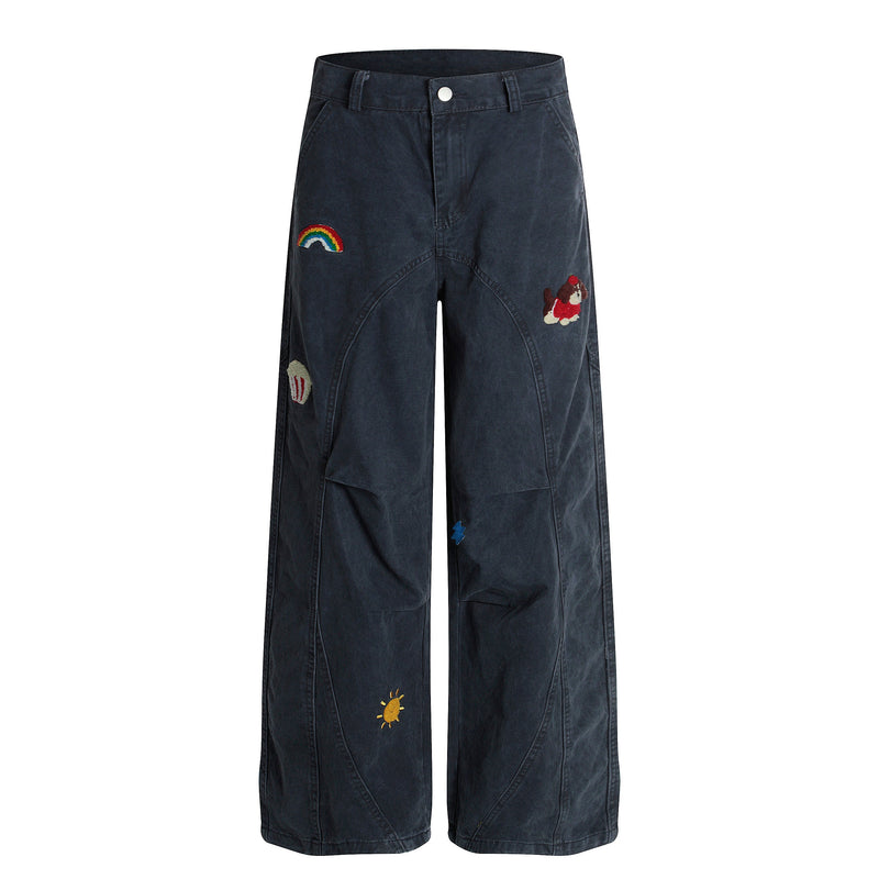 Navy wide-leg pants front view with rainbow, dog, popcorn, blue note and sun embroidery