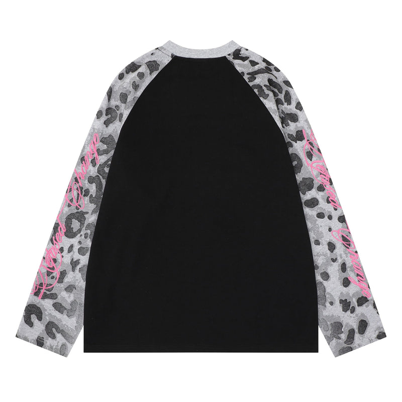Back of black raglan long sleeve tee with gray leopard-print sleeves and pink script detail