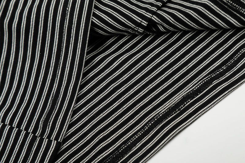 Close-up of striped fabric and inside hood lining on black hoodie
