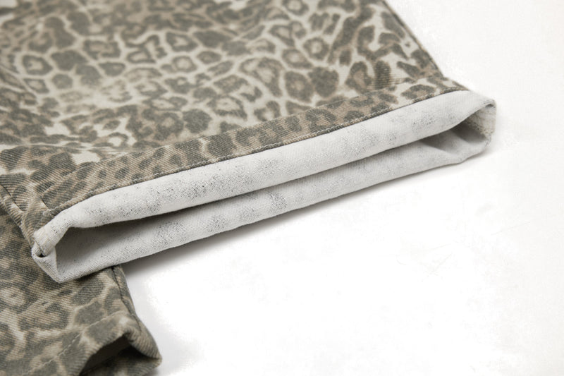 Close-up of folded pant hem showing white inner lining