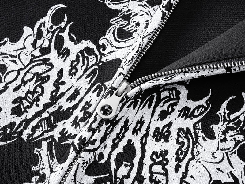 Close-up of black and white gothic print around the zipper on the hoodie front