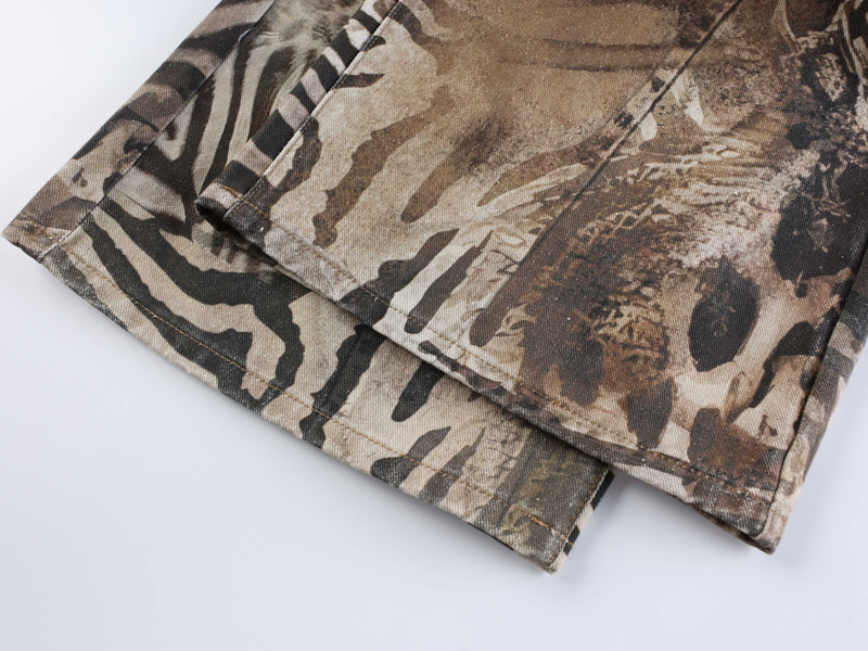 Cuffed hem detail with zebra and spotted animal print on the jeans leg