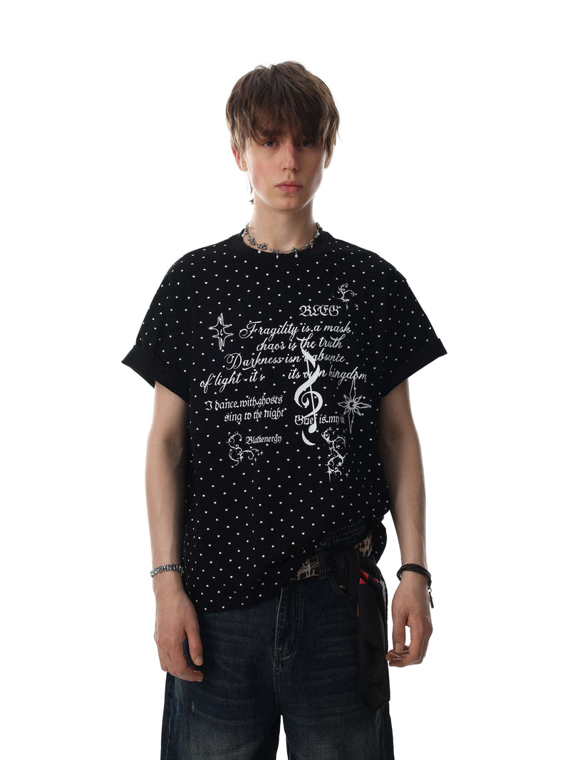 Black relaxed fit graphic tee with allover micro-heart print and white script artwork on the front