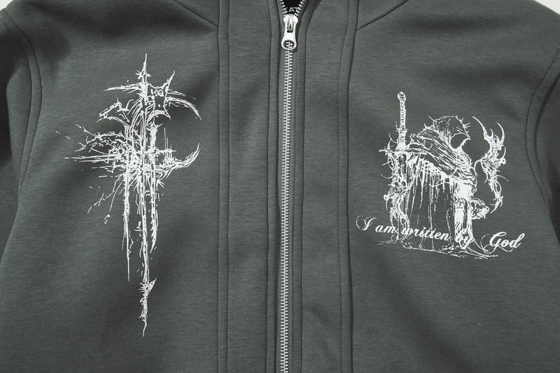 Close-up of dark green hoodie chest graphics and center zipper