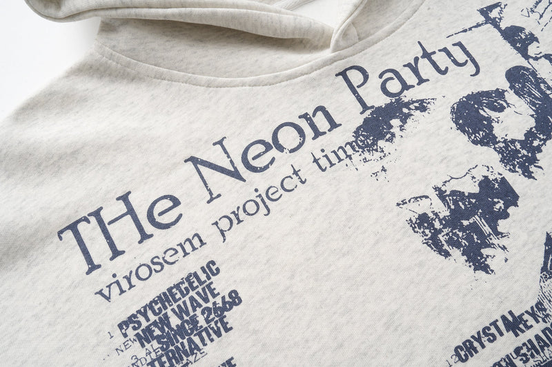 Printed text graphic on front of light gray oversized hoodie