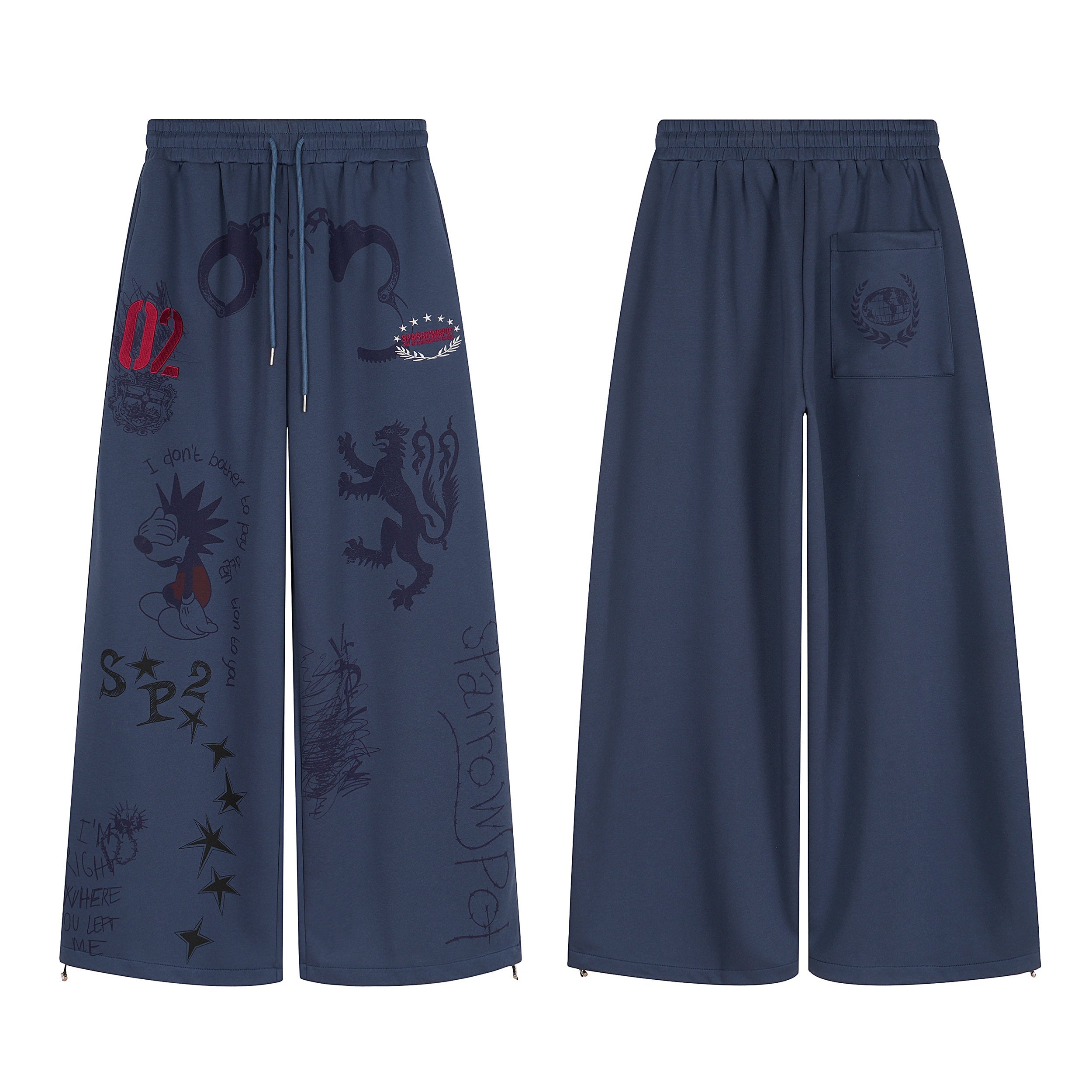 Navy wide-leg sweatpants with all-over sketch graphics, heraldic lion print, embroidered emblems, and drawstring waist, front
