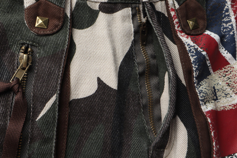 Close-up of camo cargo pants zipper fly and pocket hardware with Union Jack panel