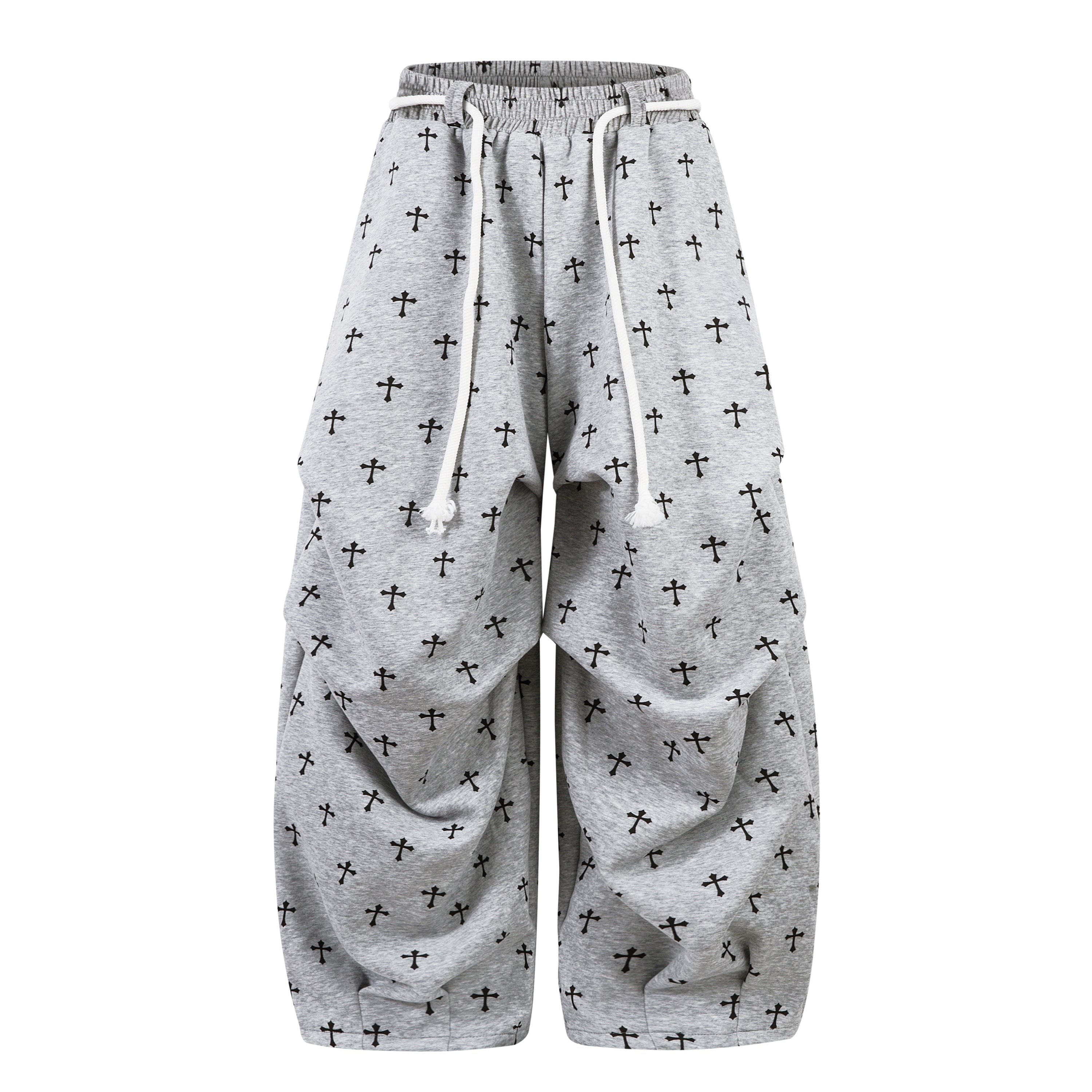 Grey heathered wide-leg sweatpants with all-over black cross print and white drawstring waistband, front view
