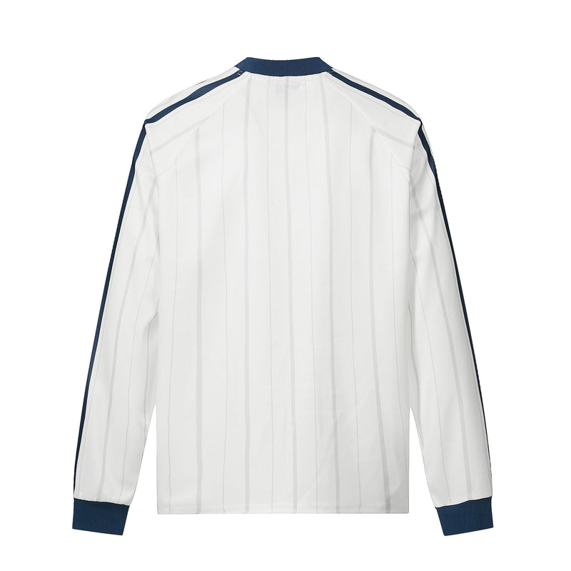 Back view of white long-sleeve football jersey with navy trim and vertical pinstripes