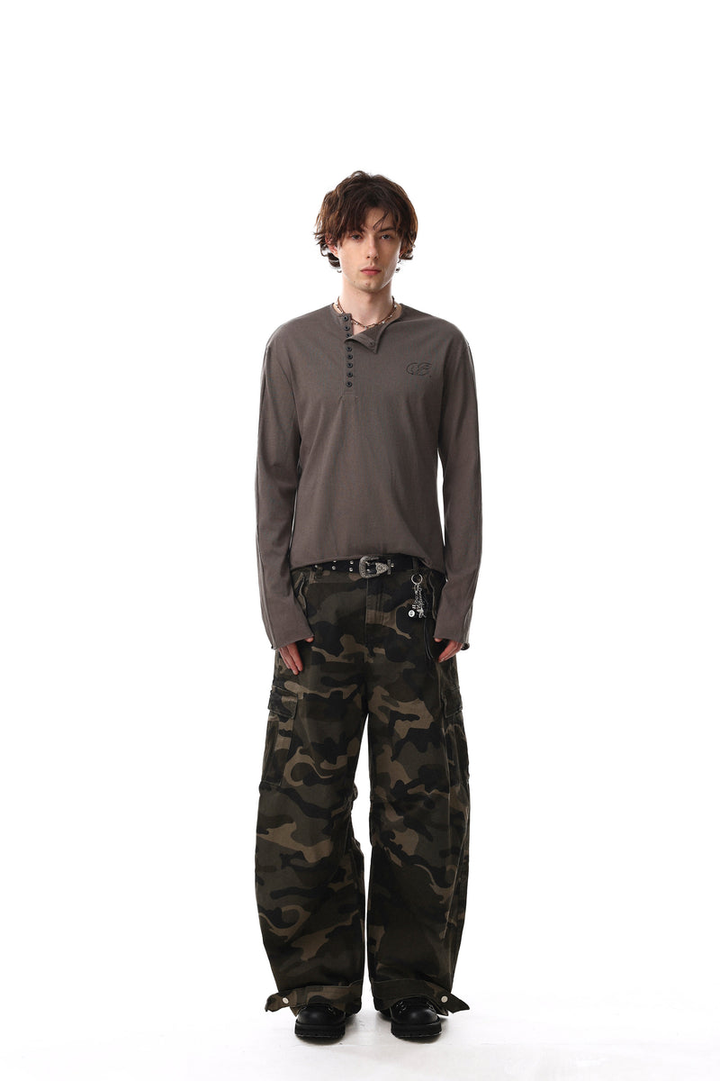 Full-length model view wearing brown Henley long sleeve T-shirt and camouflage pants
