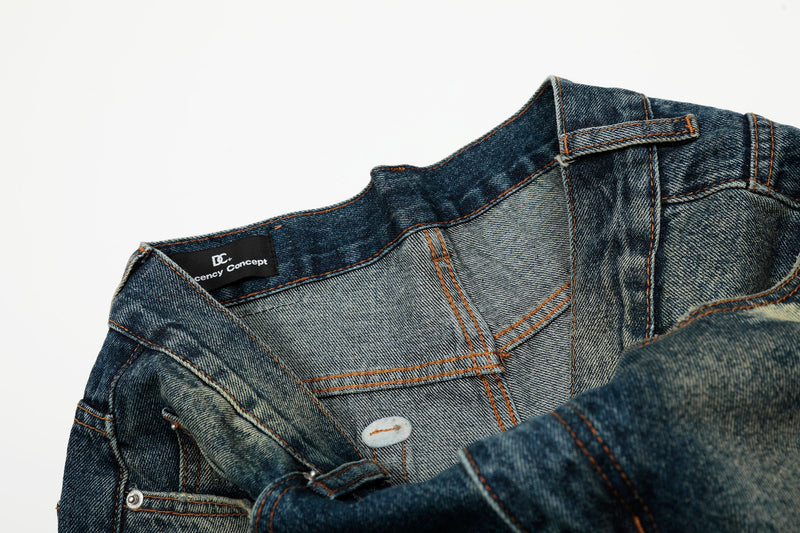 Inside waistband close-up showing black brand label and denim lining