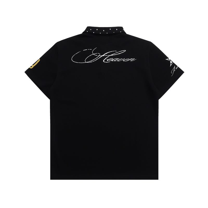 Black graphic polo shirt with studded collar and cursive back print, shown flat on a white background