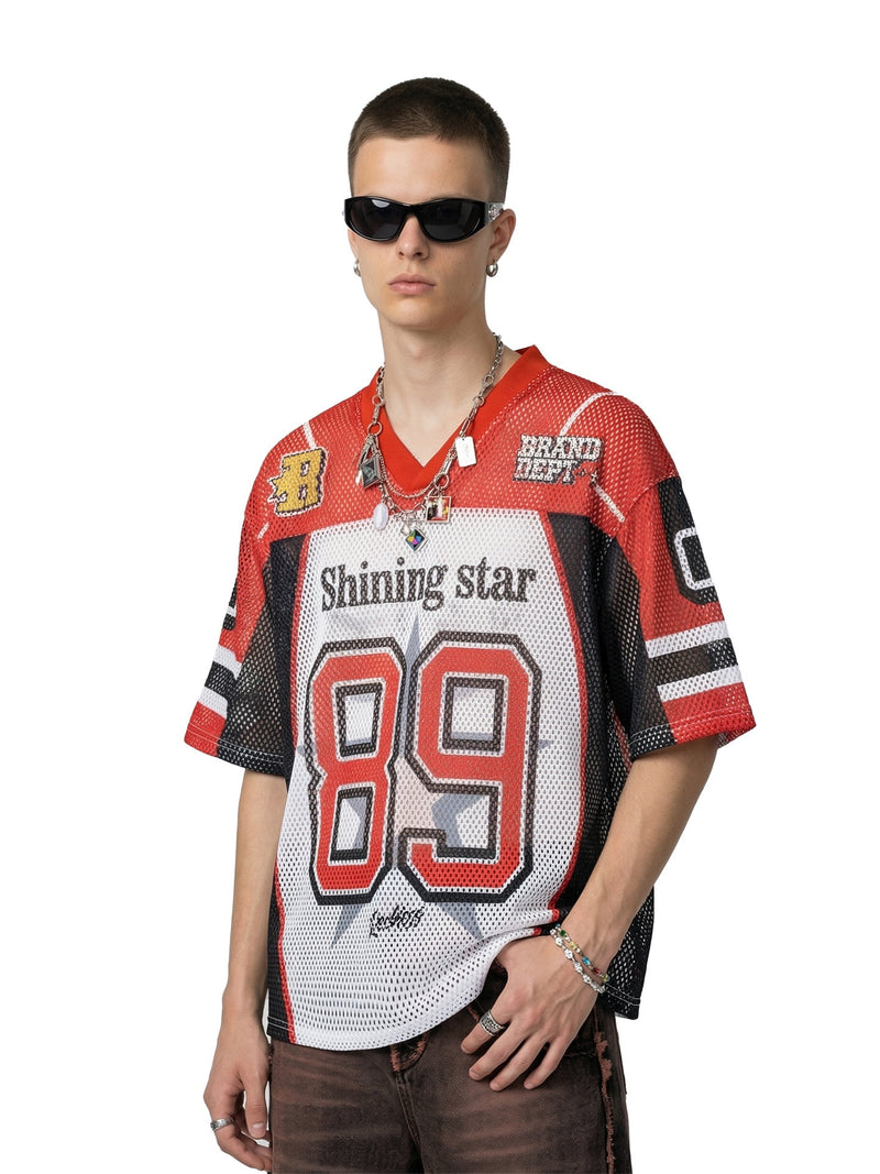 Model wearing a red and white mesh football jersey with number 89, Shining Star graphic, and streetwear styling