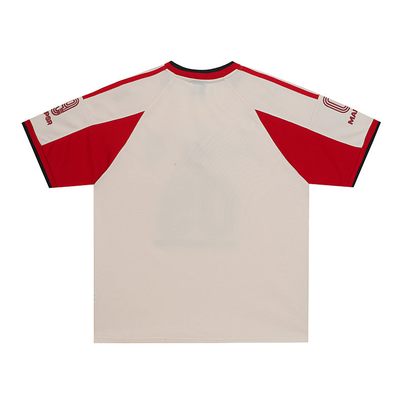 Red and white MADEGPSR 09 performance soccer jersey with short sleeves and black trim on a plain background