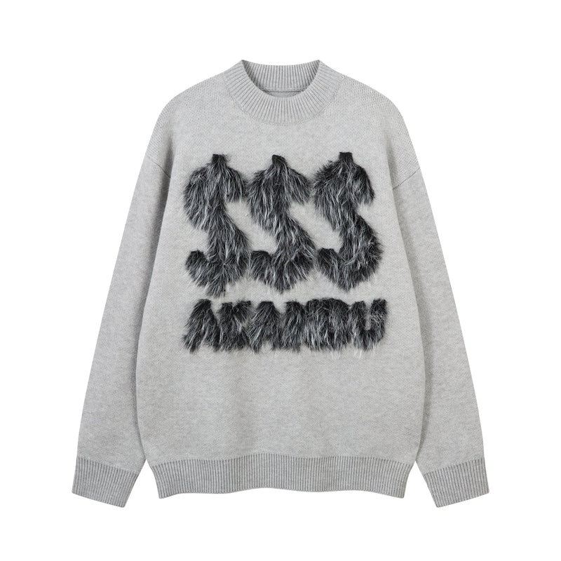 Gray knit sweater front with black-and-white faux-fur lettering