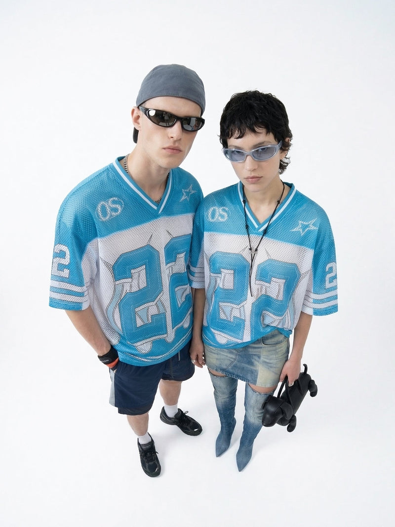 Blue mesh jersey T-shirt with bold number 22 graphic, worn by two models in a streetwear studio shoot