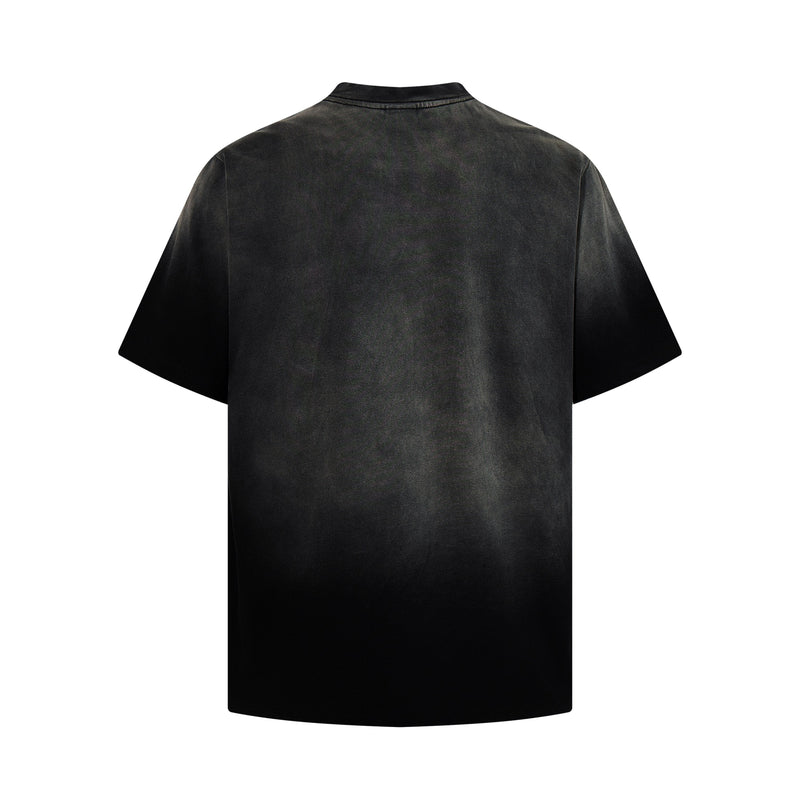 Black washed graphic T-shirt with a faded punk-inspired finish and relaxed short sleeves, shown from the back