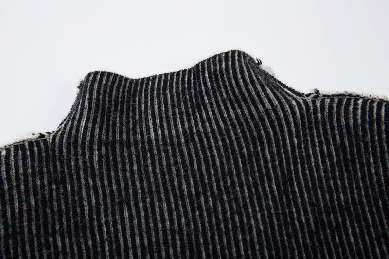 Close-up of black and gray ribbed knit turtleneck collar