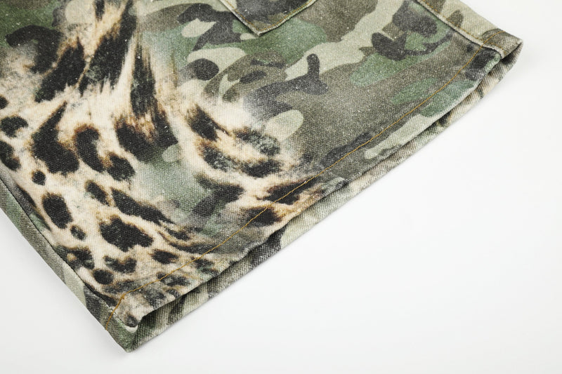 Close-up of hem and side seam on leopard camo cargo shorts