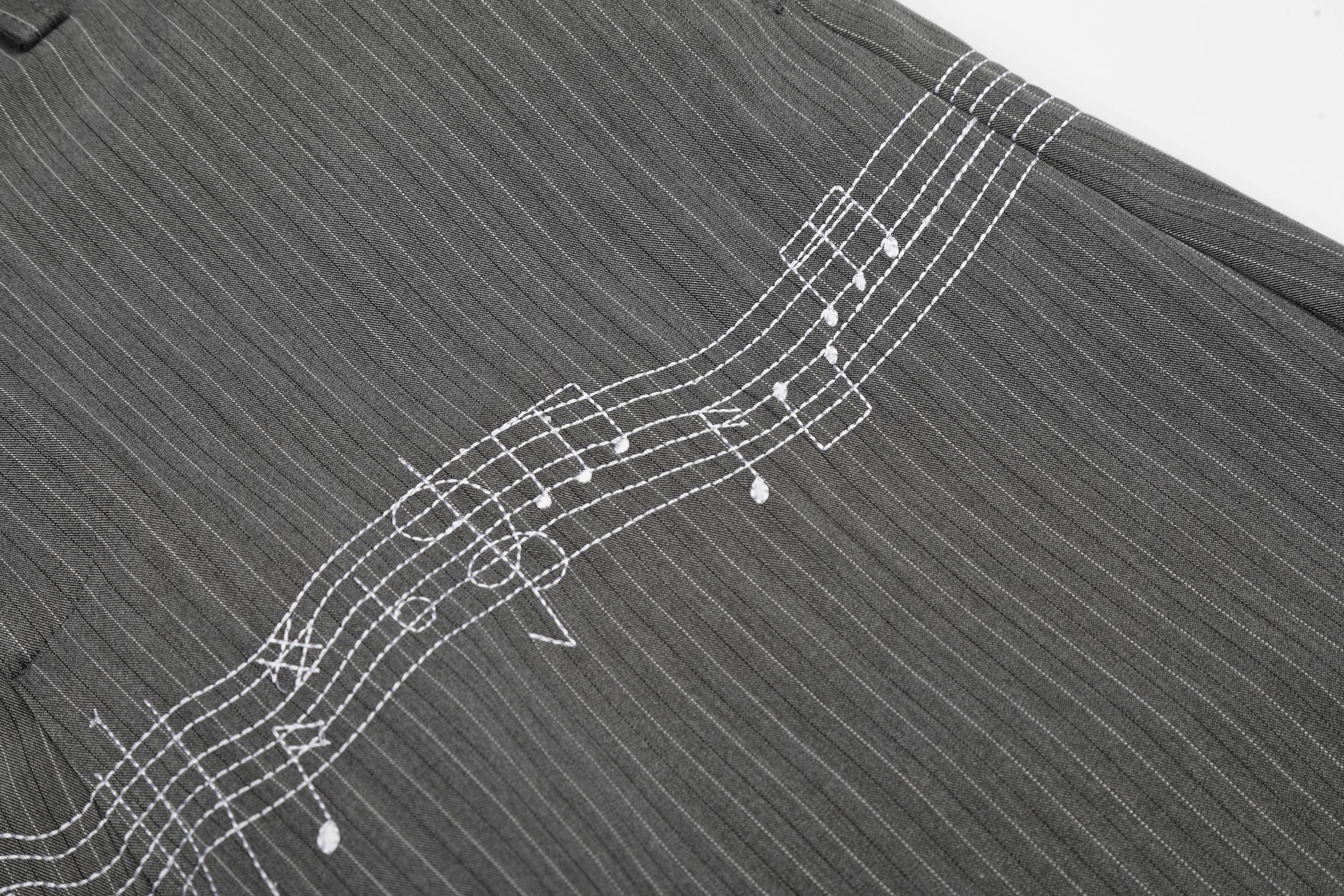 Pinstripe Wide-Leg Pants with Music Staff Graphic | Omirad