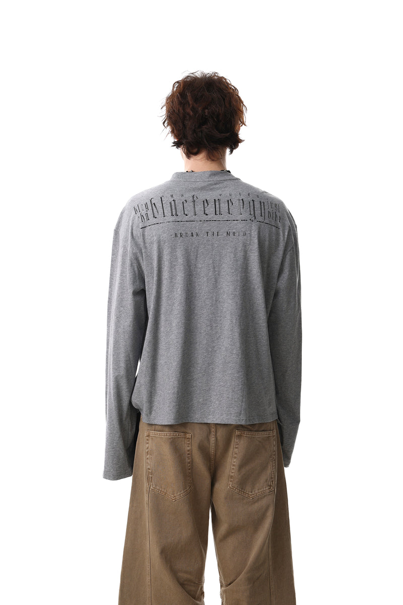 Gray henley tee worn by model, back view with arched back print