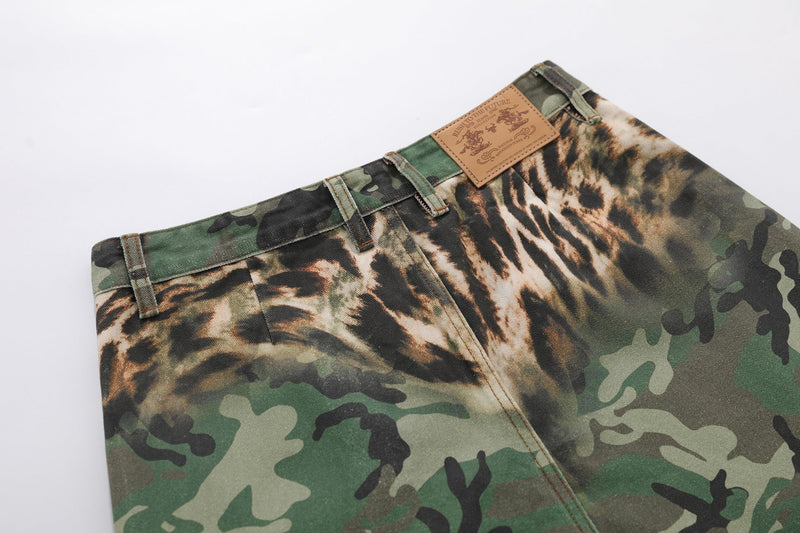 Close-up of the upper back section of the pants with tan patch label and belt loops