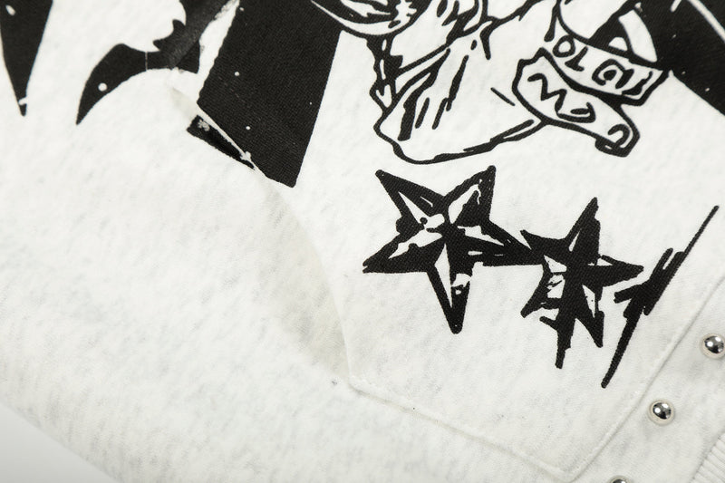 Close-up of white hoodie front graphic with stars and anime-style line art