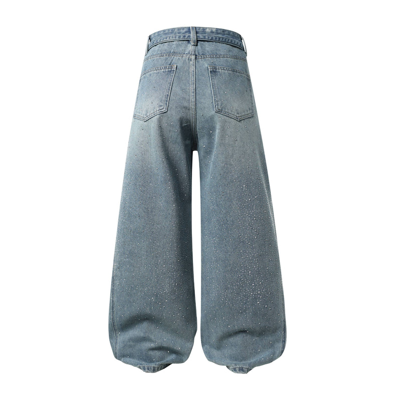 Back view of light blue wide-leg jeans with rhinestone speckles and patch pockets