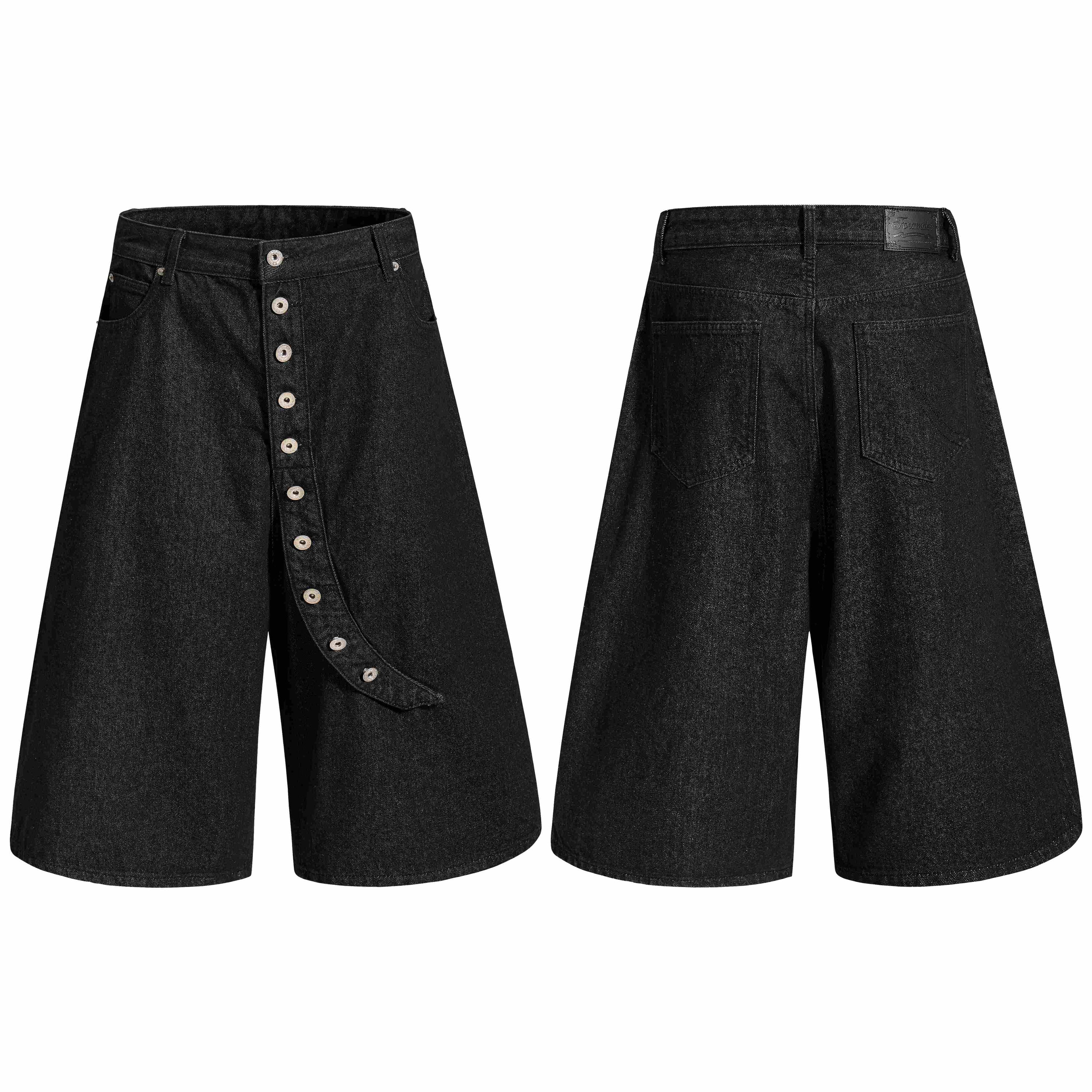 Front and back view of black wide-leg denim shorts with curved asymmetric button panel and five-pocket design