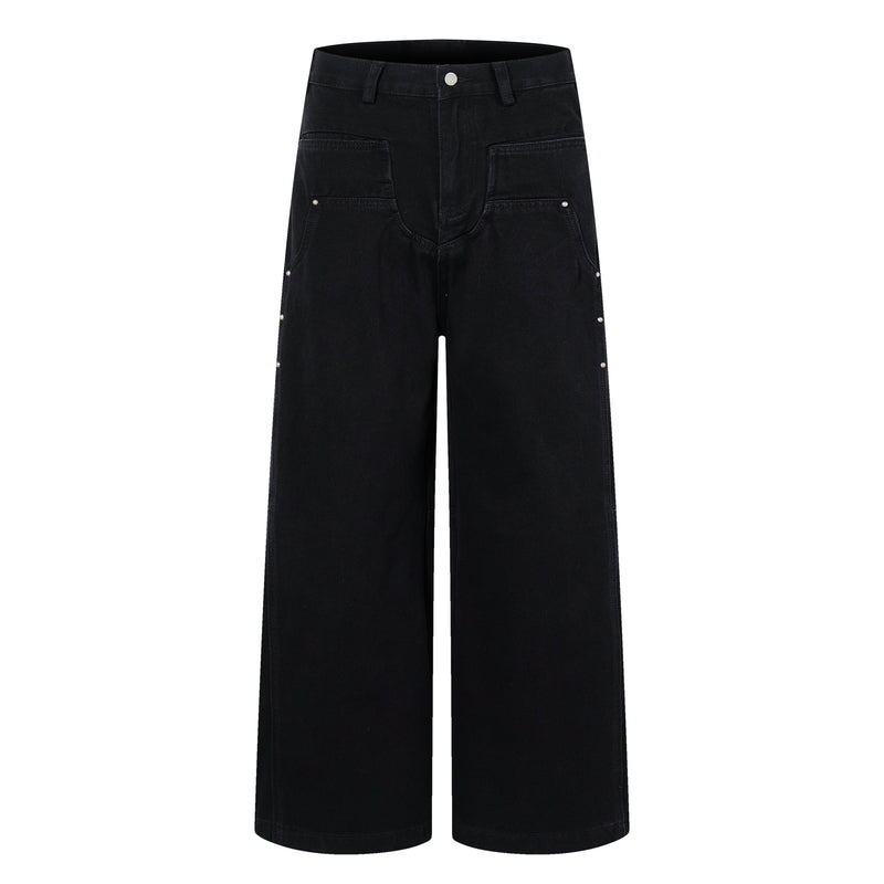 Front view of black wide-leg jeans with studded utility pockets and straight hems