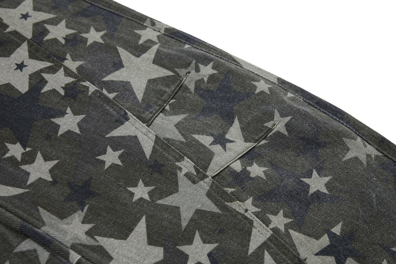 Close-up of back yoke and seam detail on printed denim jeans