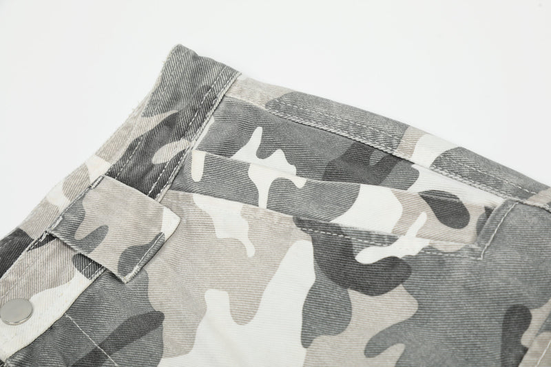 Close-up of the back waistband and pocket seam on gray camo cargo pants