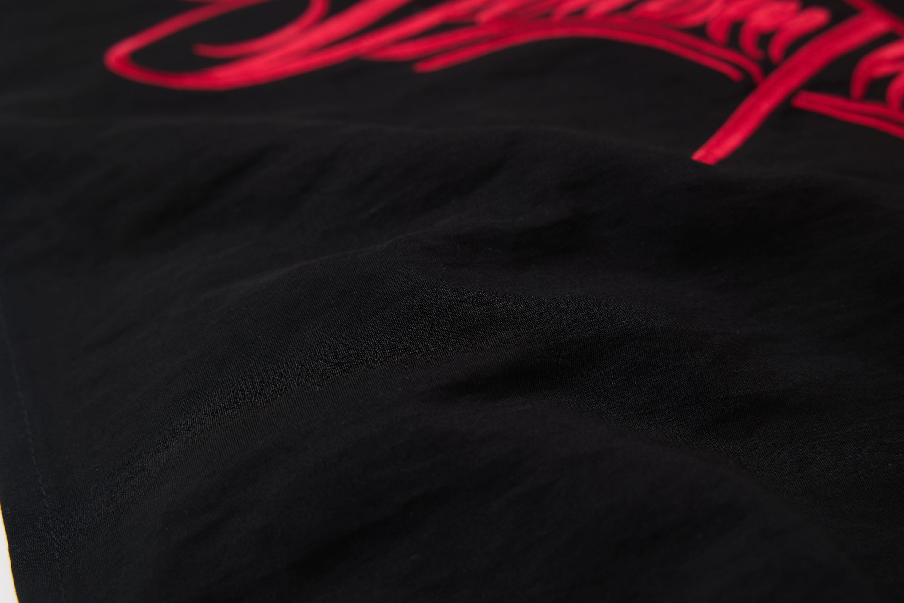 Wide-Leg Jeans with Red Embroidery & Side Drape | SEAKOFF