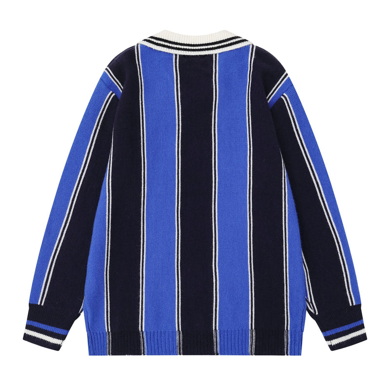 Back view of black and blue striped knit sweater with white collar