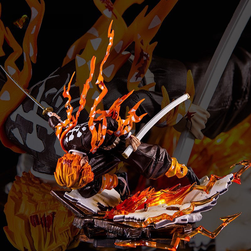 The Rengoku Kyojuro Demon Slayer Figure by Demon Slayer showcases the Flame Hashira in action with a sword featuring fiery accents, crouching on a sharp, flame-themed base. Made of high-quality PVC, this 28cm figure presents a dynamic and dramatic visual.