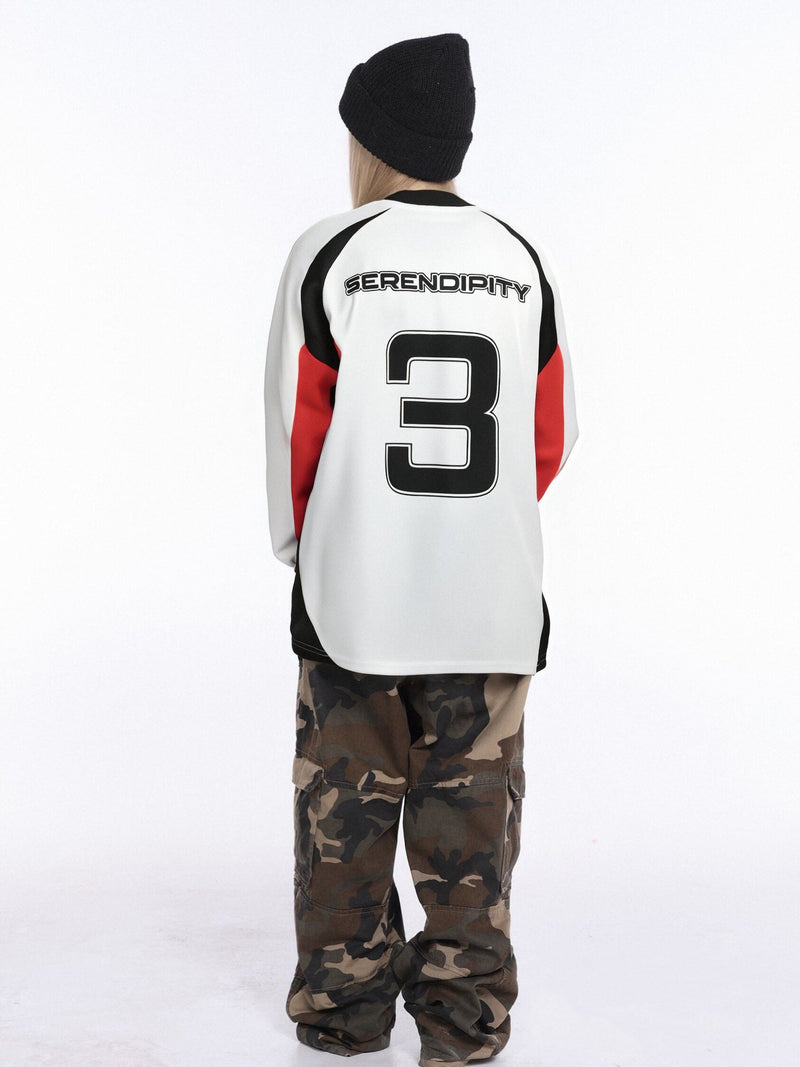 Back view of white long-sleeve football jersey on model, showing Serendipity text and large number 3