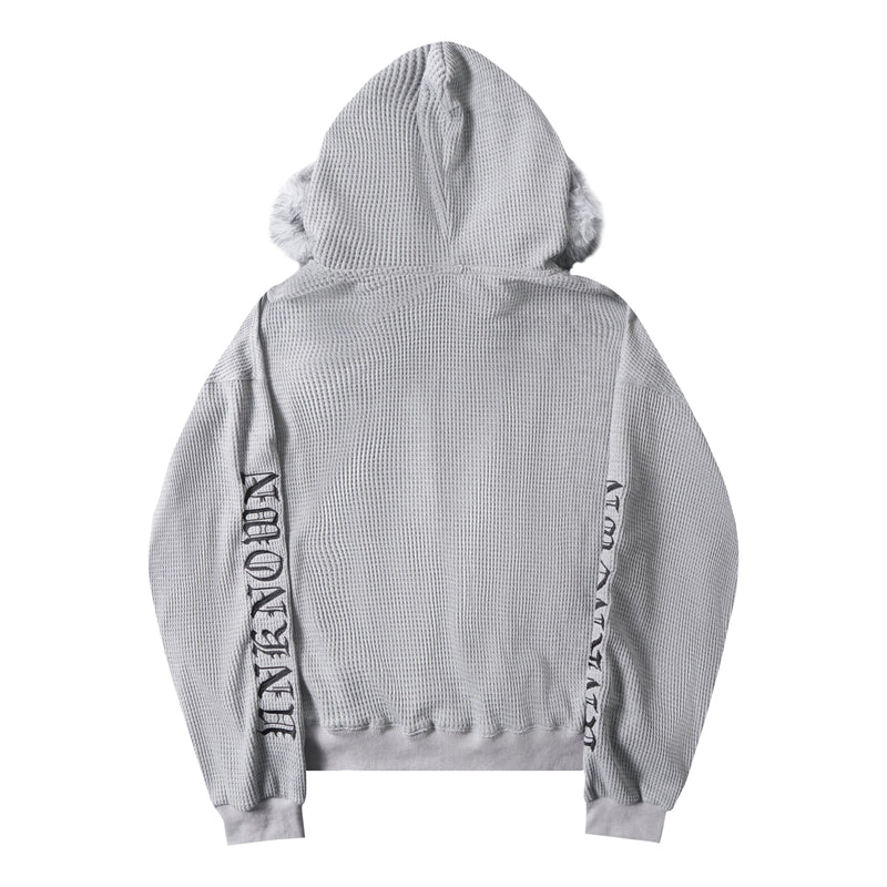 Light gray waffle knit zip-up hoodie shown from the back with faux fur hood trim
