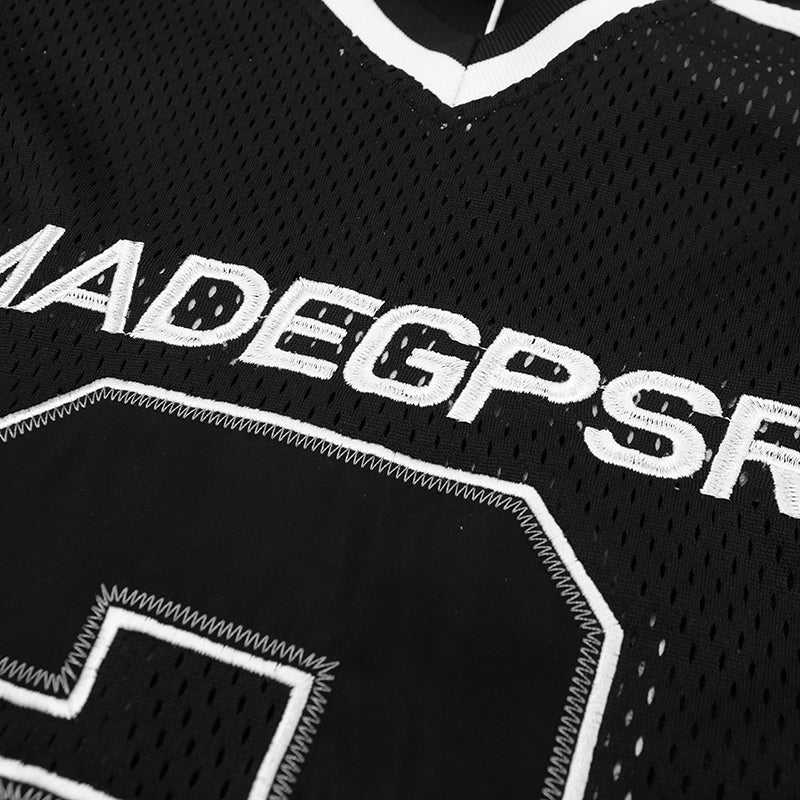 Black mesh oversized football jersey tee with white embroidered lettering and varsity number graphic