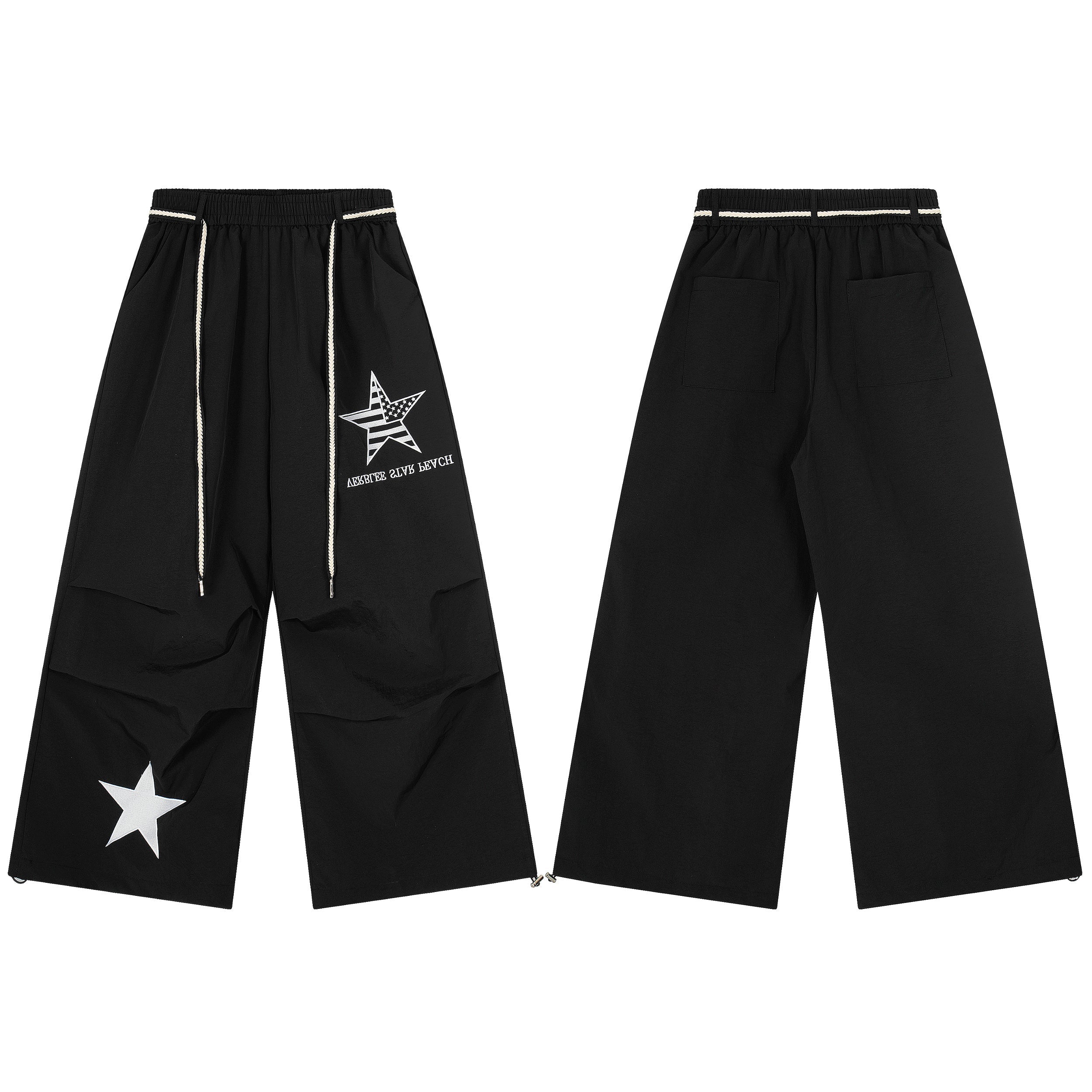 Black nylon wide-leg pants with American flag star graphic print and white star patch on lower leg, front and back view