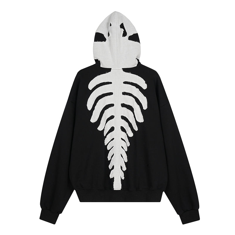 Back view of black zip-up hoodie with white skeleton graphic on the hood and back