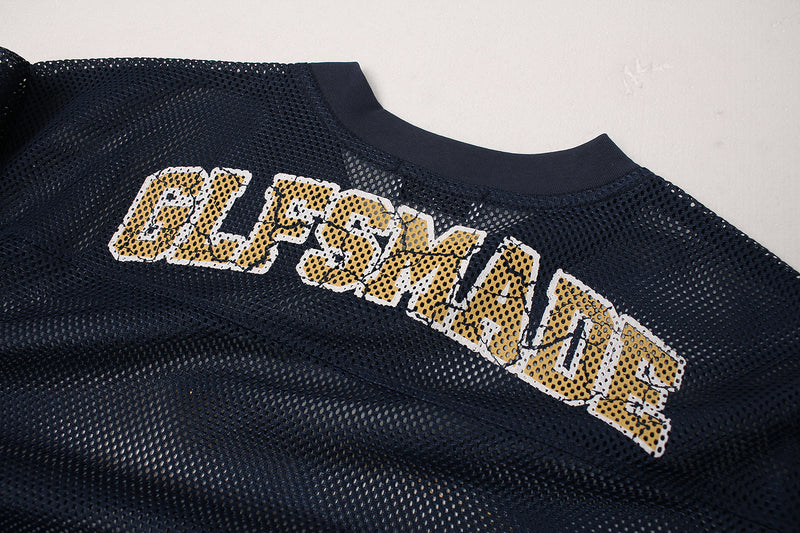 Black mesh football jersey with yellow distressed Seakoff print and ribbed crew neck collar