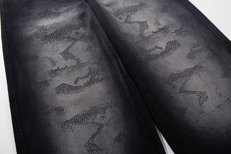 Close-up of the front thigh area with gray camo-like print