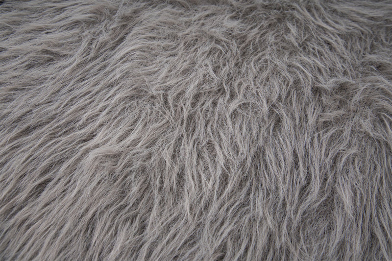 Close-up of gray long-fur knit texture on sweater body