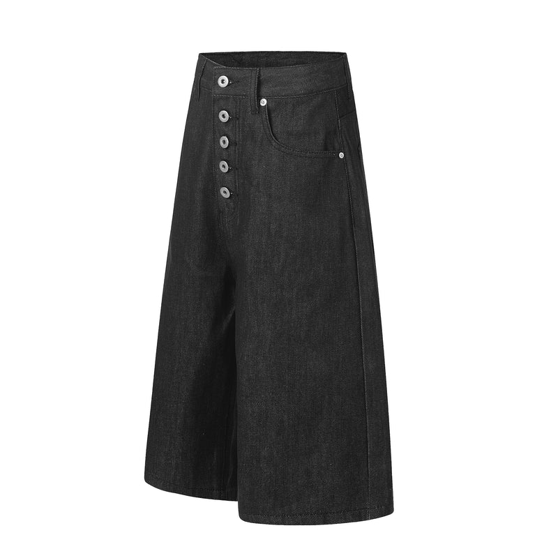 Front view of black wide-leg denim jorts with button fly and curved front pocket