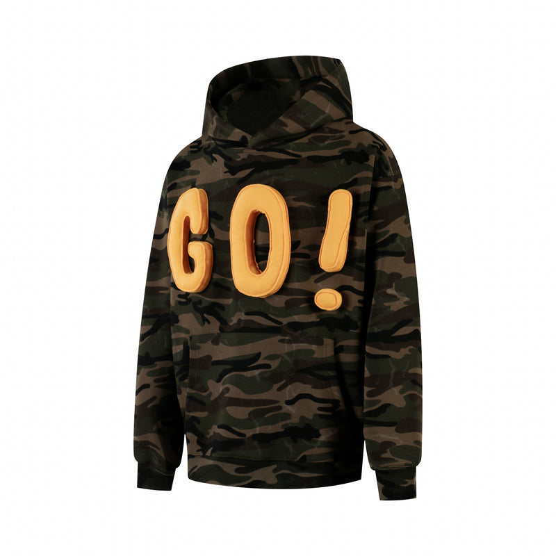 Front view of camo hoodie showing yellow puff GO! lettering and ribbed cuffs